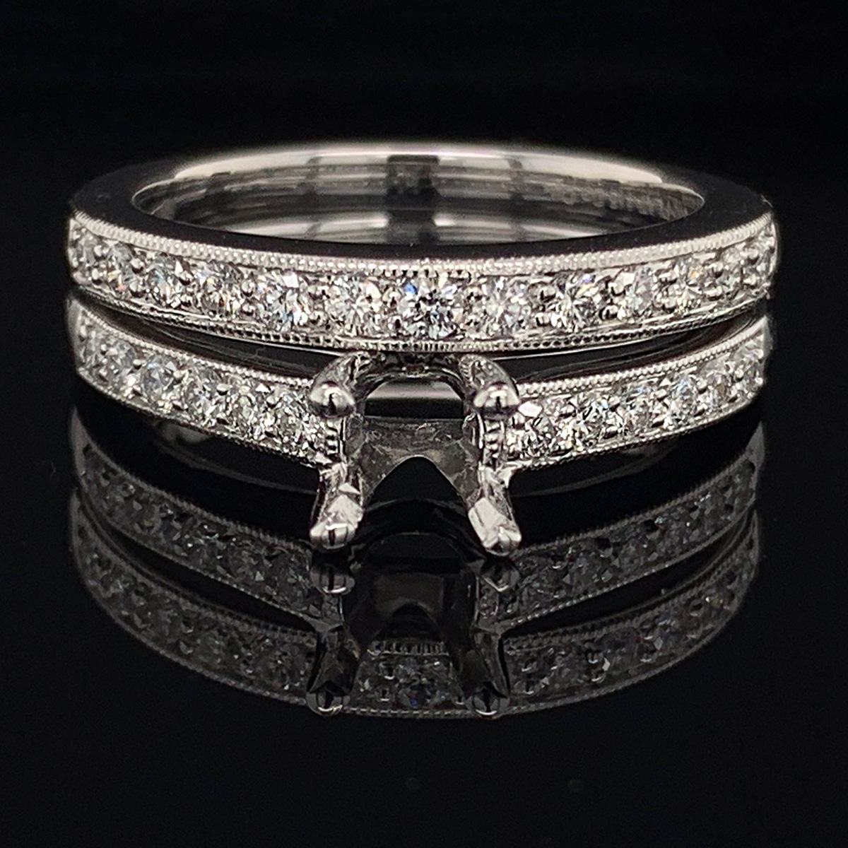 https://www.geraldsjewelry.com/jewelry-details/585-platinum-and-diamond-semi-mount-wedding-set/15225
