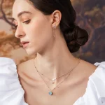https://www.lovebythemoonstudios.com/collections/rhodium-plated-brass/products/sky-blue-love-note-silver
