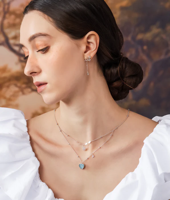 https://www.lovebythemoonstudios.com/collections/rhodium-plated-brass/products/sky-blue-love-note-silver