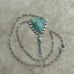 Source : https://tribalstonejewelry.com/products/kova-skaggs-jasper-and-sterling-silver-necklace