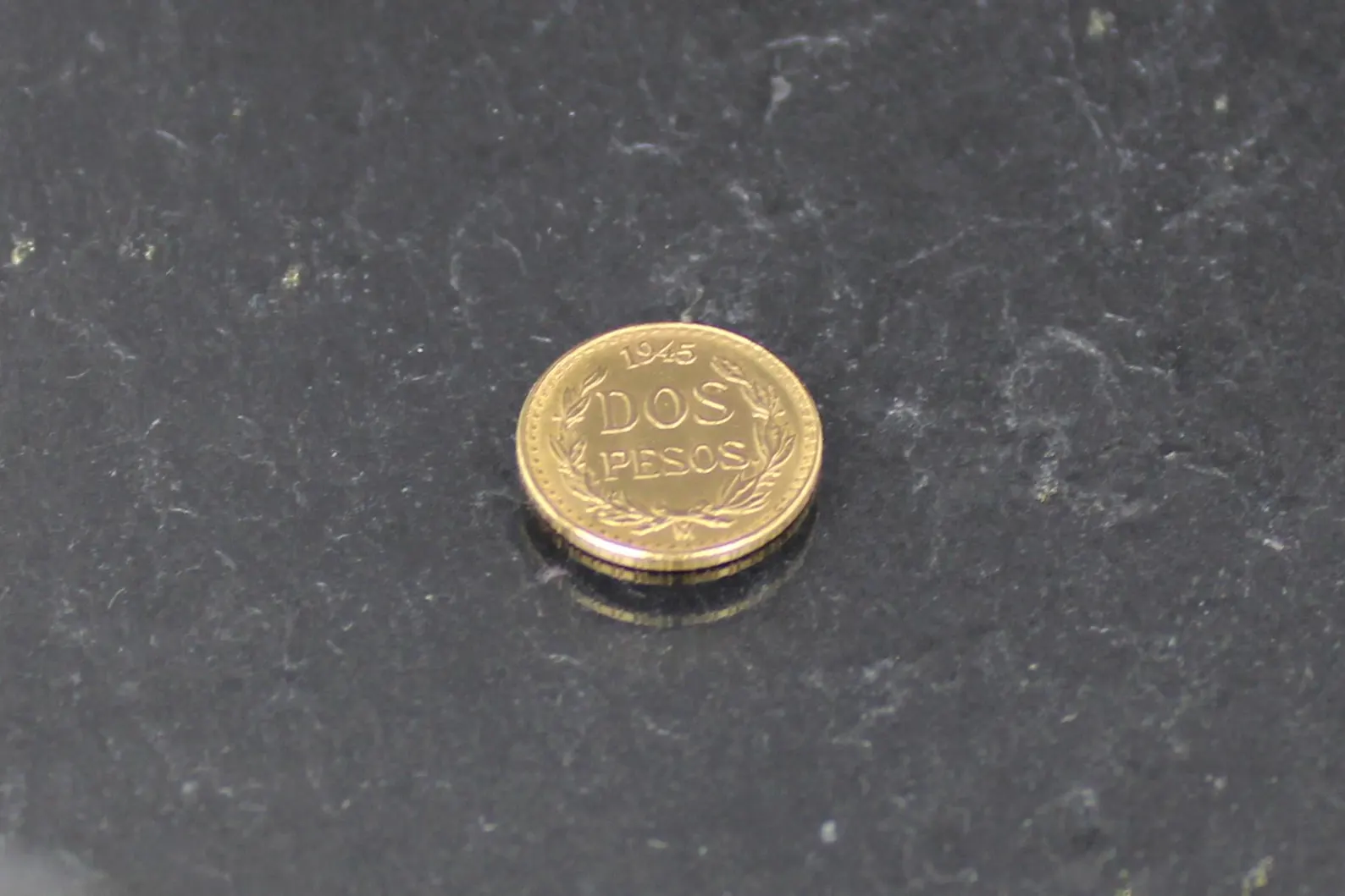 Source : https://www.etsy.com/sg-en/listing/4506180726/gold-coin-1945-dos-pesos-mexico-900-gold?ls=s&ga_order=most_relevant&ga_search_type=all&ga_view_type=gallery&ga_search_query=900+Coin+Gold&ref=sr_gallery-1-3&spe=him&content_source=a9962fc0-1f4c-4f2b-9de3-2edae50ba3d2%253ALT09b05454555a13759803142f5ead20e33f4a8aba&organic_search_click=1&logging_key=a9962fc0-1f4c-4f2b-9de3-2edae50ba3d2%3ALT09b05454555a13759803142f5ead20e33f4a8aba