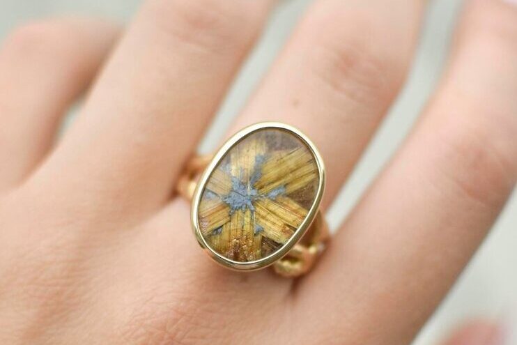 https://ithacajewelbox.com/product/rutilated-quartz-twig-ring-in-18k-green-gold/